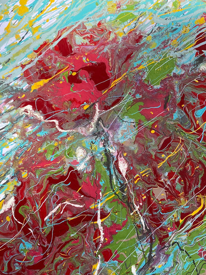 Red flowers resisting the wind