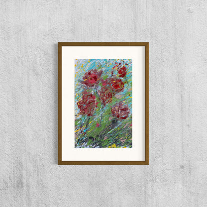 Red flowers resisting the wind