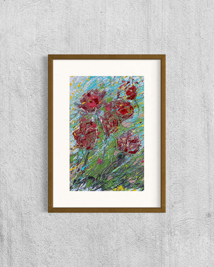 Red flowers resisting the wind